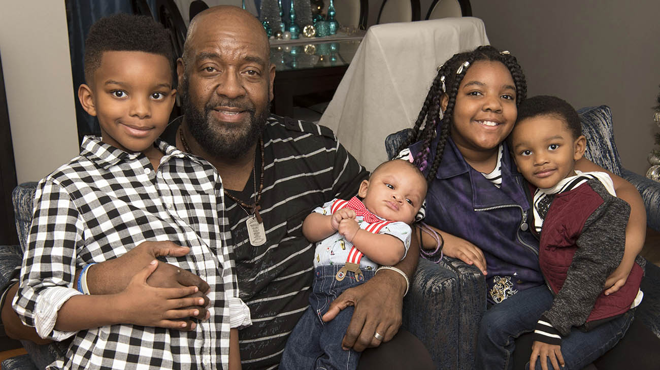 Diabetic retinopathy patient, Mark Campbell with his grandkids.