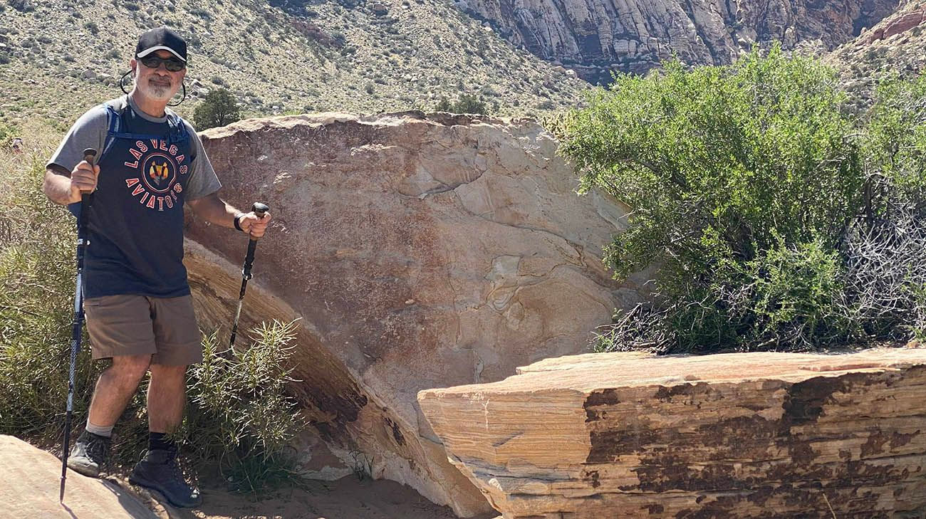 Raul Hernandez hiking in the Southwest