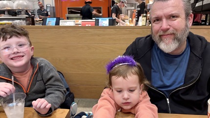 Gordon Dakin (right) with his two children