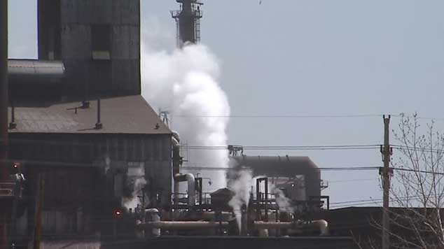 Smoke coming from an industrial building.