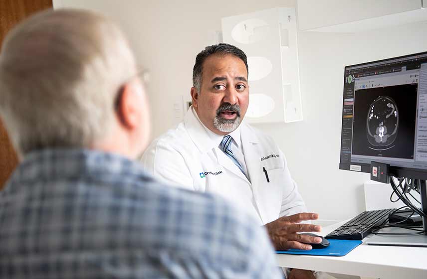 Cleveland Clinic doctor talking with a patient
